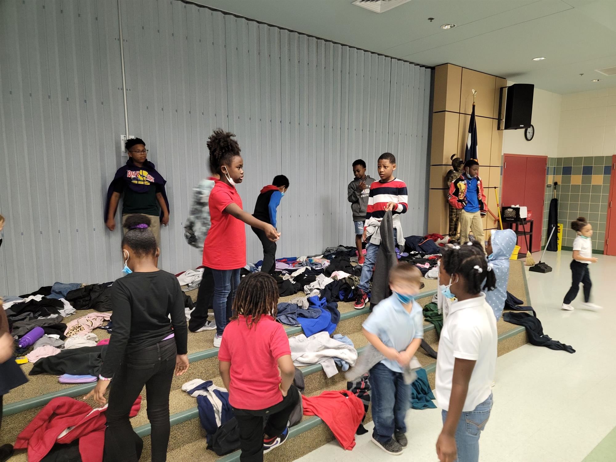 Sue Crouch Elementary students sorting clothes