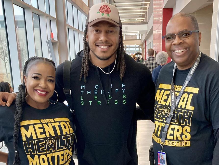 Trent Shelton with staff 